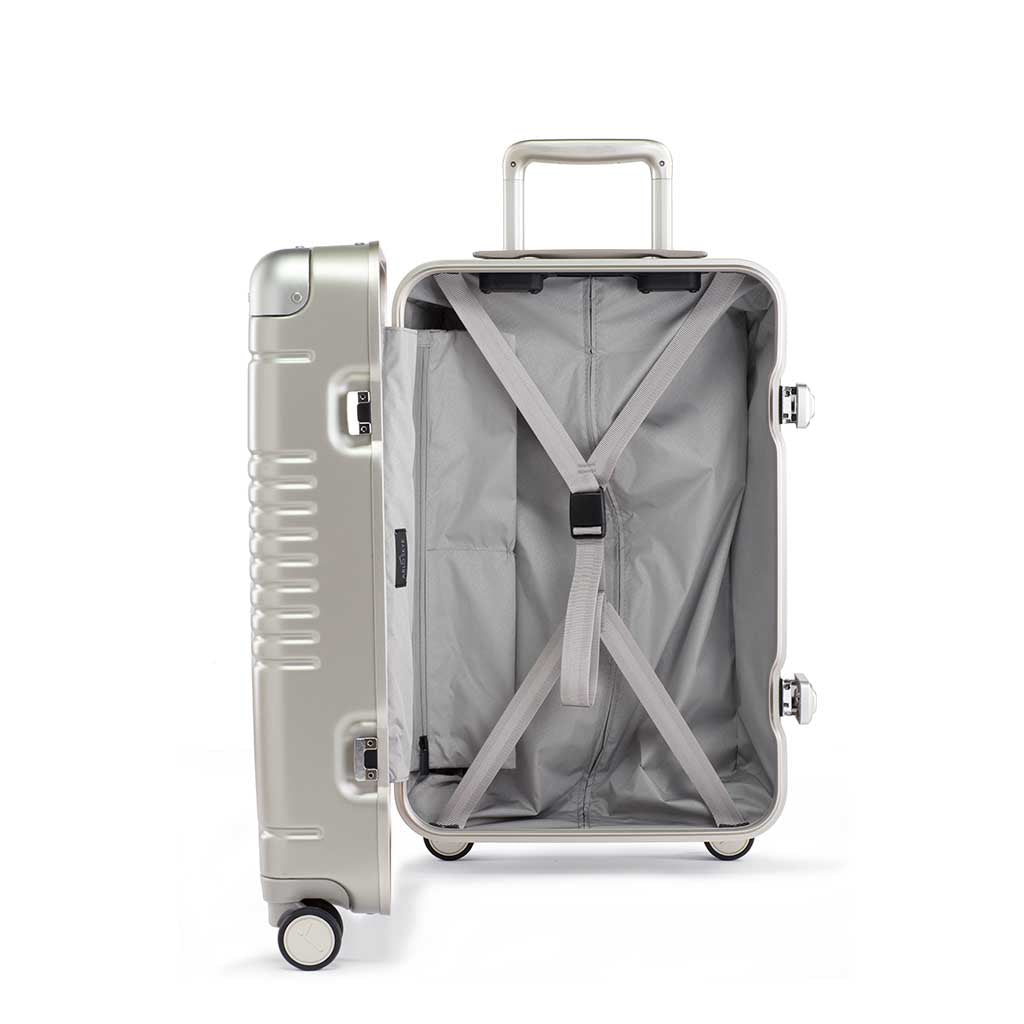 Side view of the frame carry-on max in champagne showing the interior of the left shell