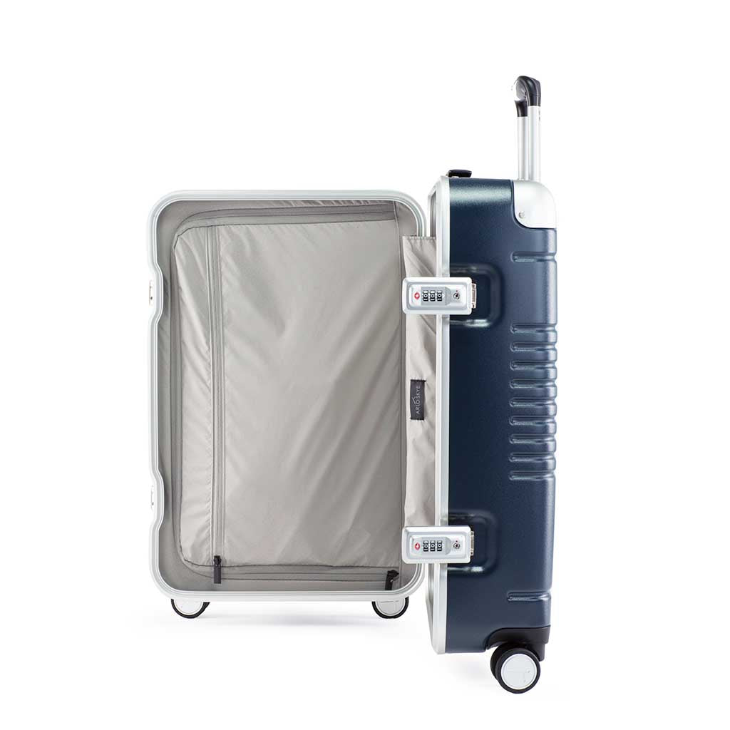 Side view of the frame carry-on max in navy blue showing the interior of the right shell