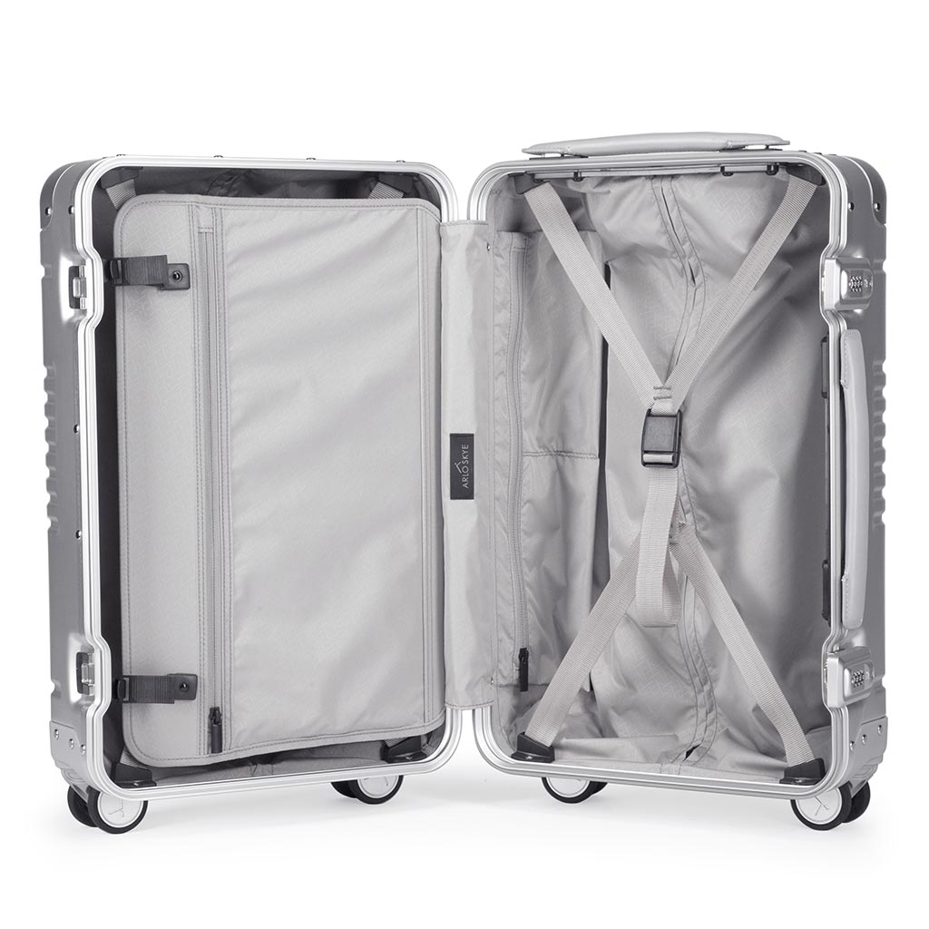 Open frame carry-on in silver aluminum edition showing the interior of both sides