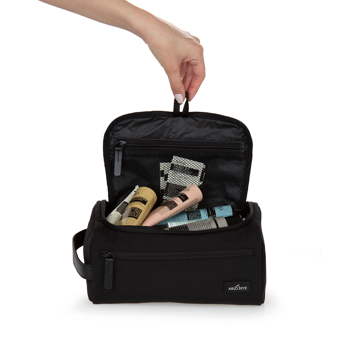 toiletry bag in black color showing interior view.