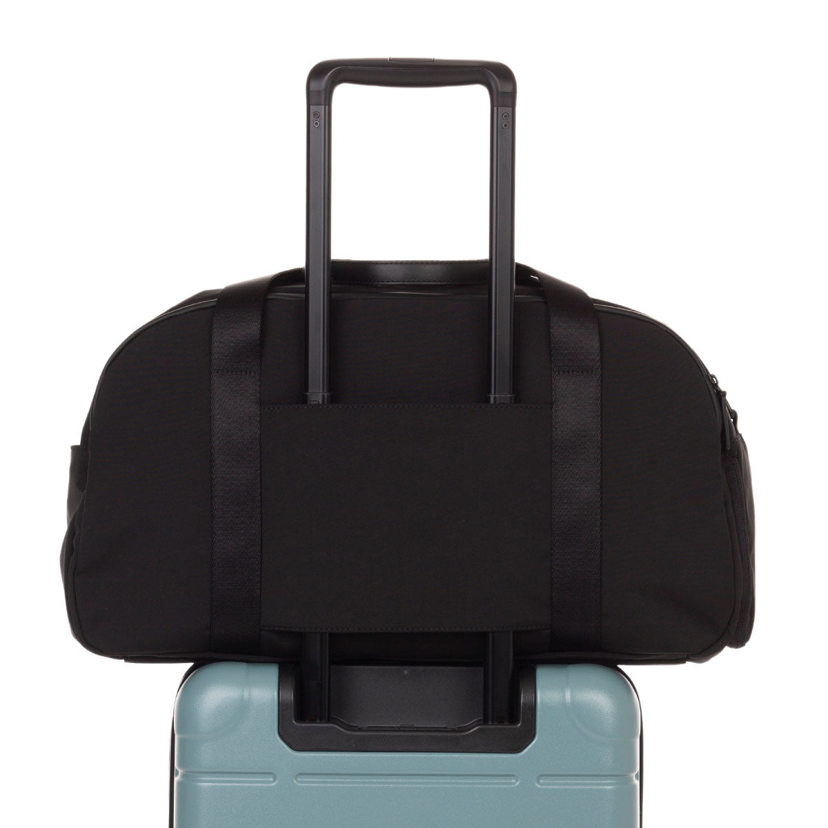 weekender in black - back view on carry-on
