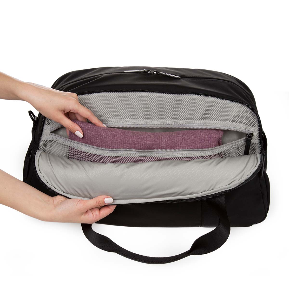 weekender in black - mesh pocket interior view.