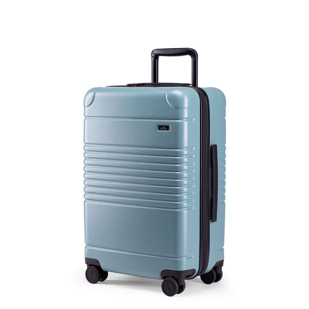 Left facing view of the zipper carry-on max in sea sage