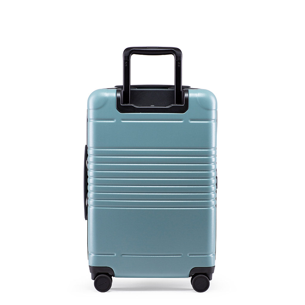 Back view of the zipper carry-on max in sea sage