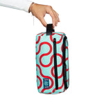 Arc Dopp Kit held in hand, lifestyle shot