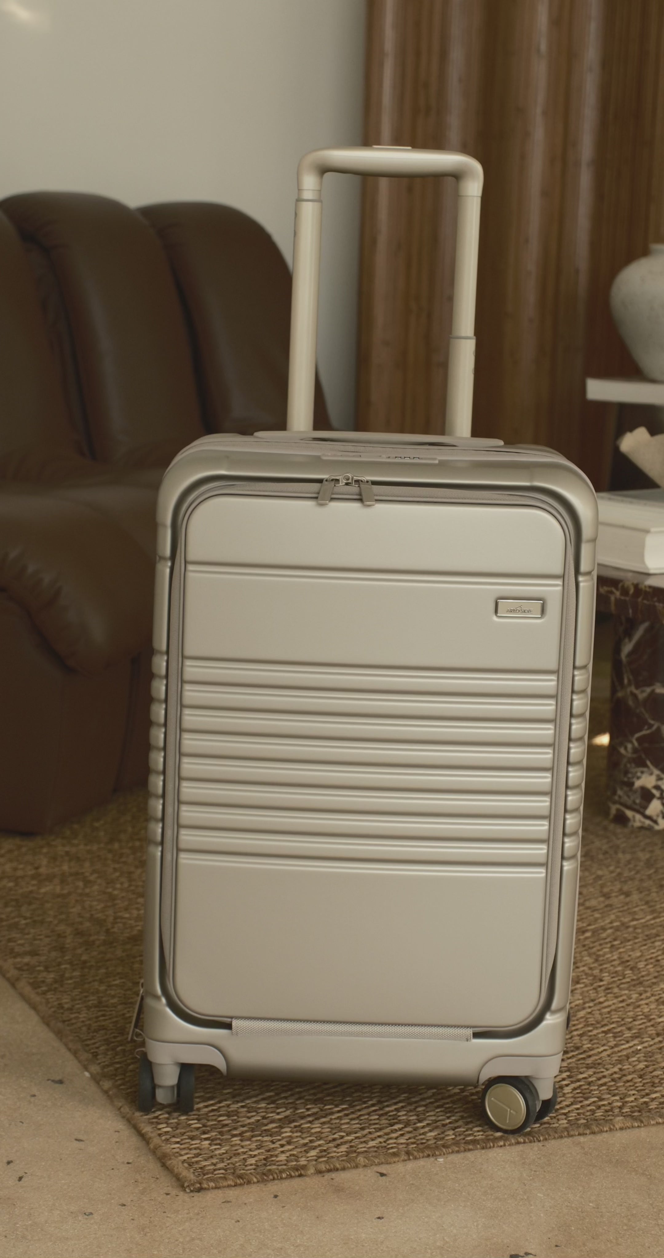 champagne carry-on max with front pocket video on how to open the lock