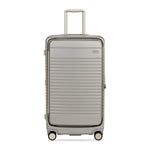 champagne trunk front view with wheels and handle on a white background