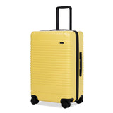 Left facing view of the expandable check-in medium in lemon