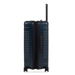 Side view of the expandable check-in medium in navy, shown expanded