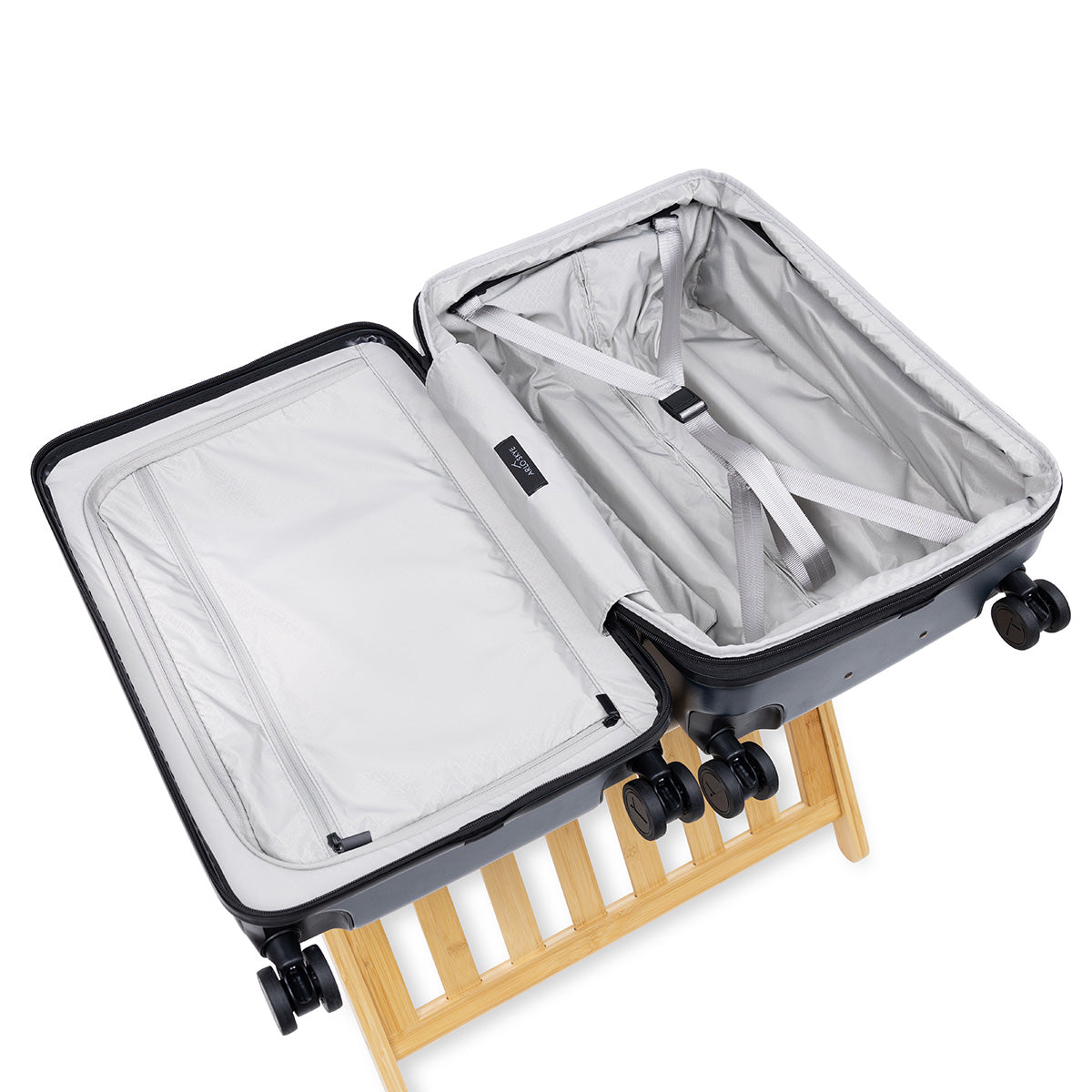 Open expandable carry-on max in navy showing both sides of the interior