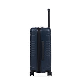 Side view of the expandable carry-on max in navy