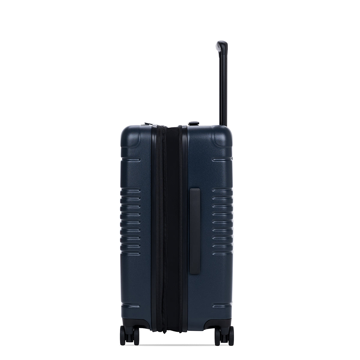 Side view of the expandable carry-on max in navy, shown expanded