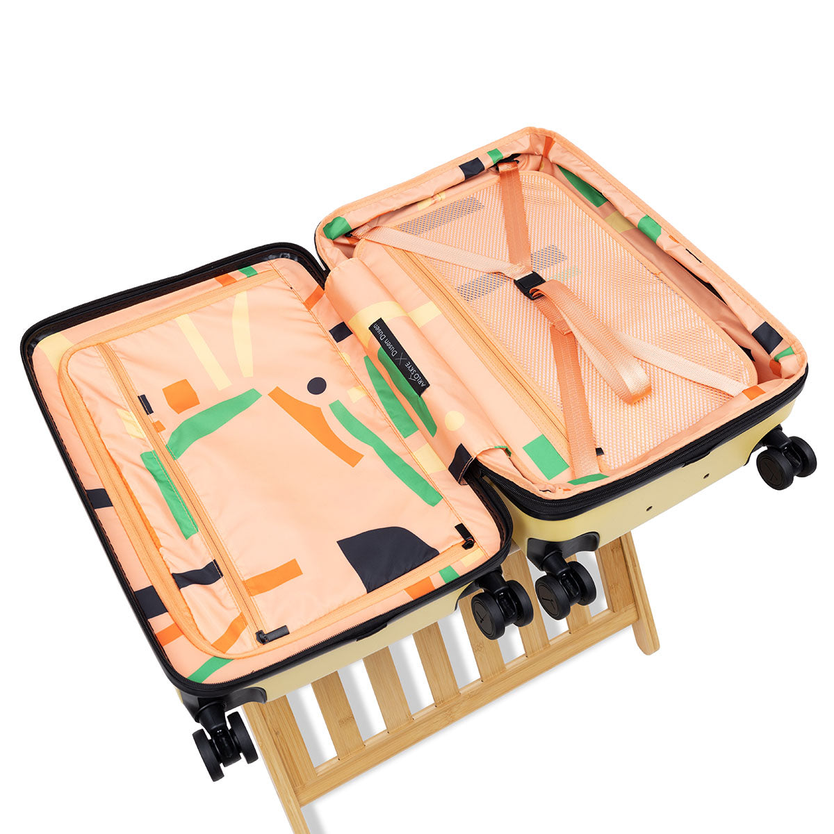 Open expandable carry-on max in lemon showing both sides of the interior with divider panel
