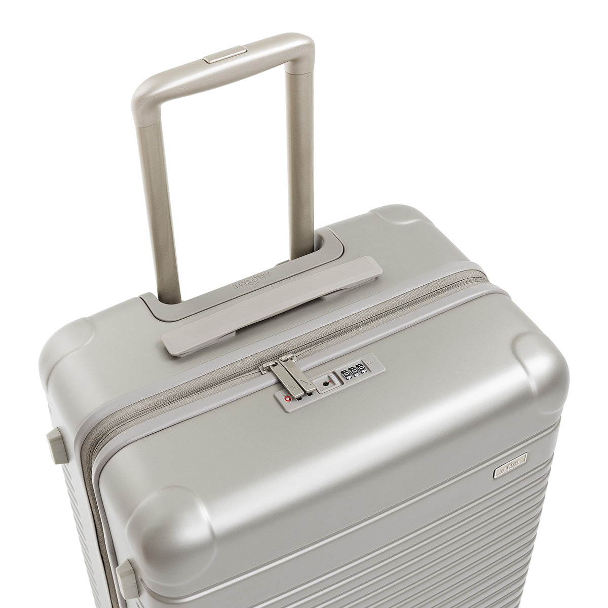 Top-down view of the expandable check-in medium in champagne showing the lock