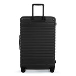 Back view of the check-in large in black