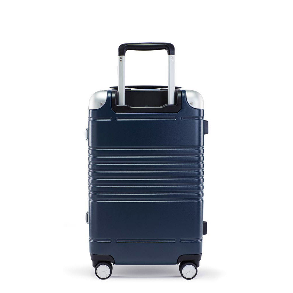 Back view of frame carry-on in navy blue