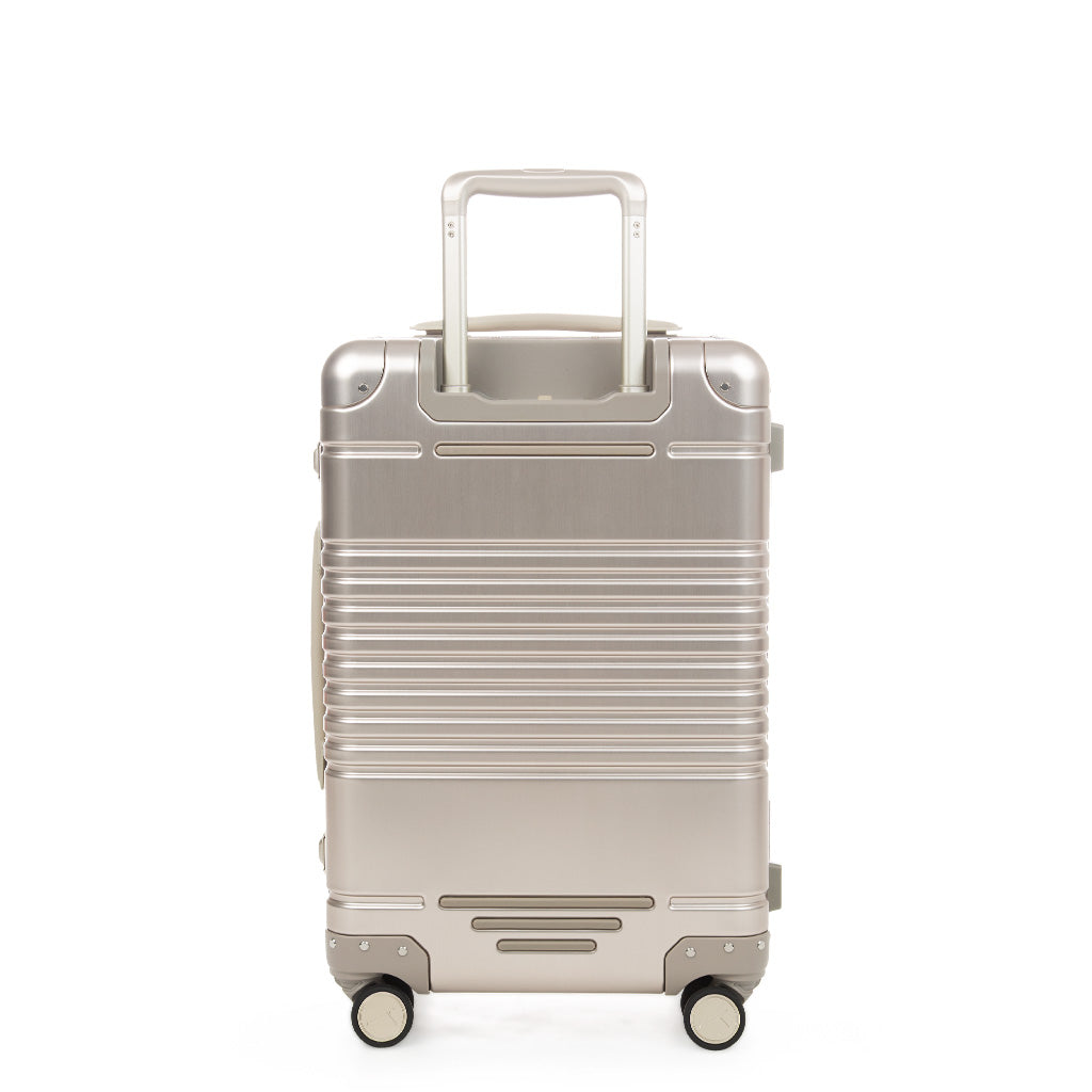 Back view of the frame carry-on max in champagne aluminum edition