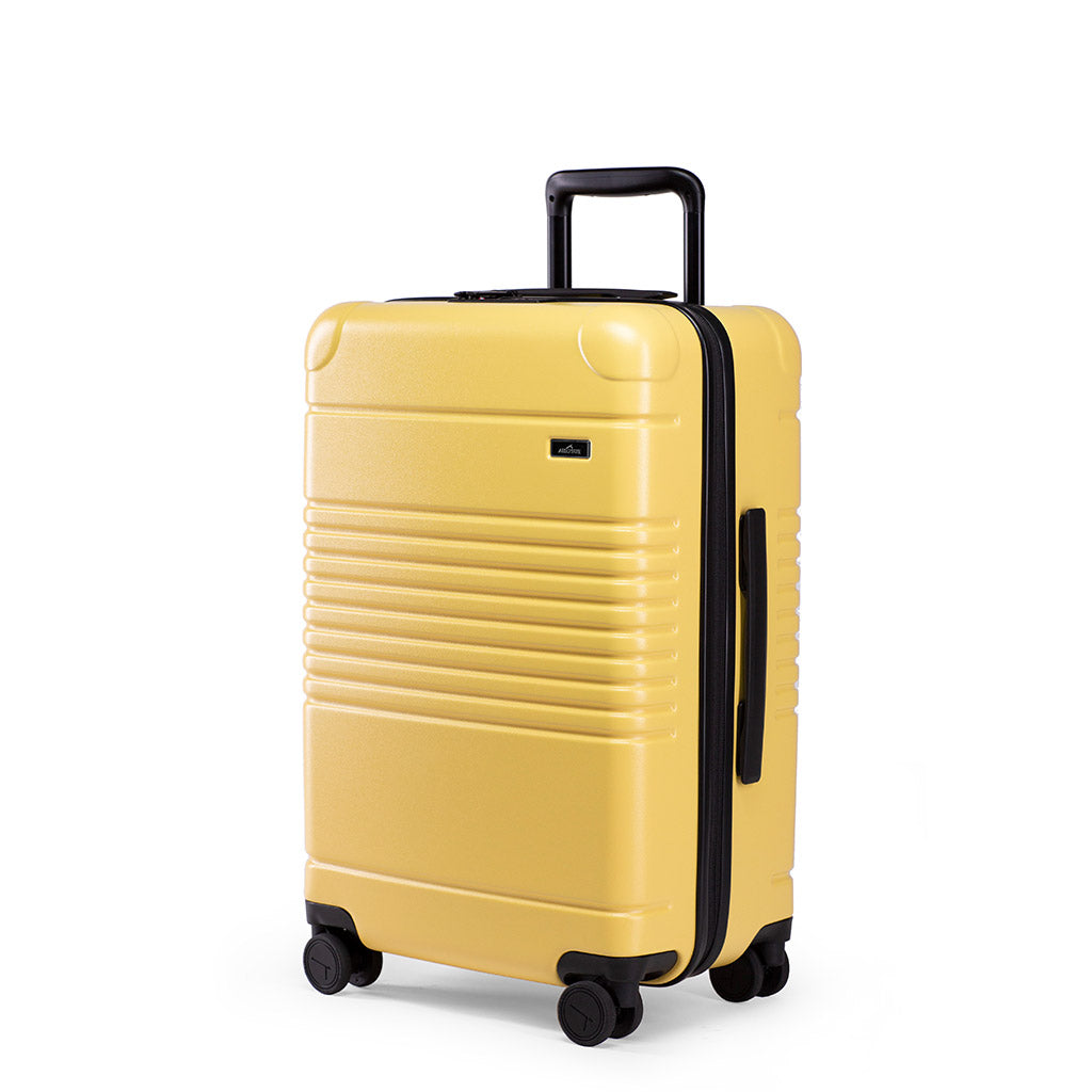 Left facing view of the zipper carry-on max in yellow