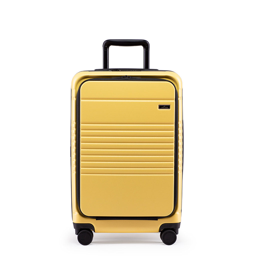 Front view of the zipper carry-on max with front pocket in yellow