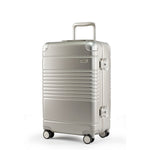 Left facing view of the Frame carry-on max in champagne.