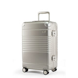 Left facing view of the Frame carry-on max in champagne.