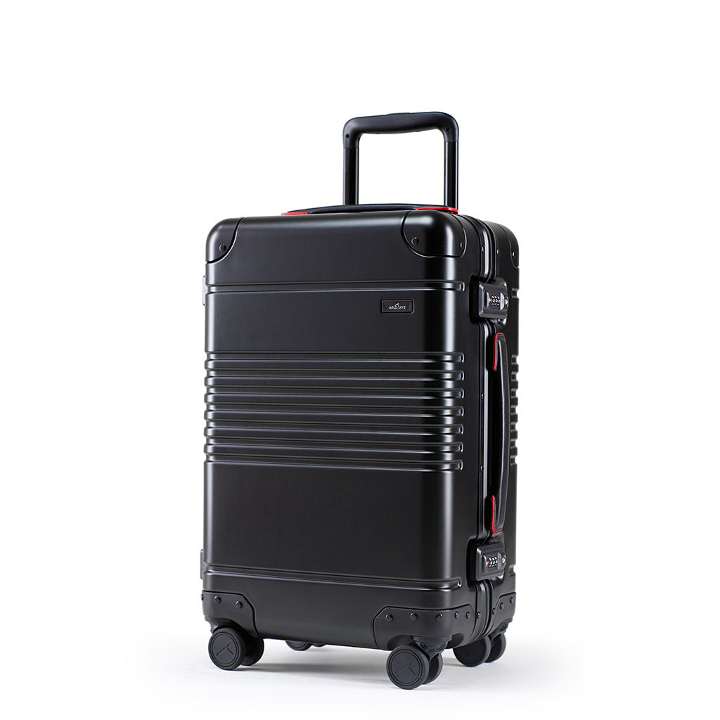 Left facing view of the frame carry-on in black with red details aluminum edition