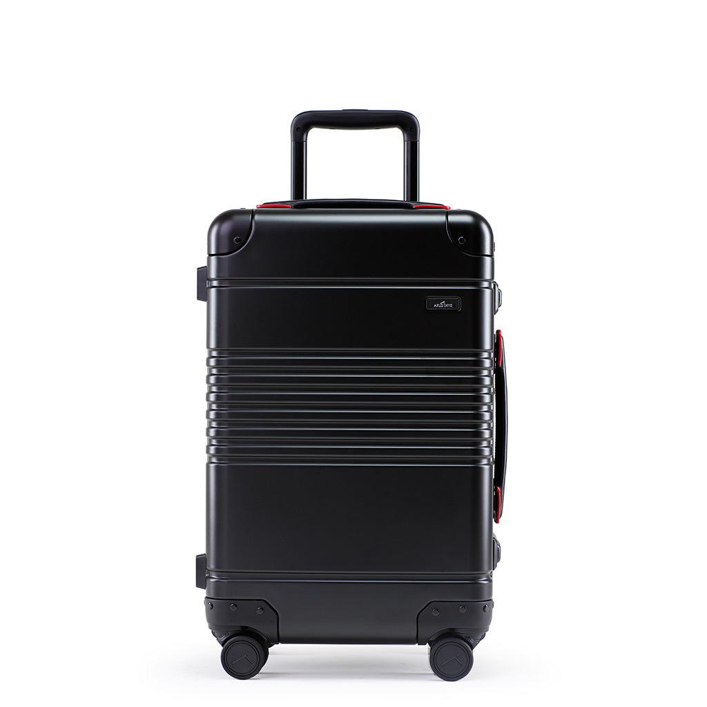 Front view of the frame carry-on in black with red details aluminum edition