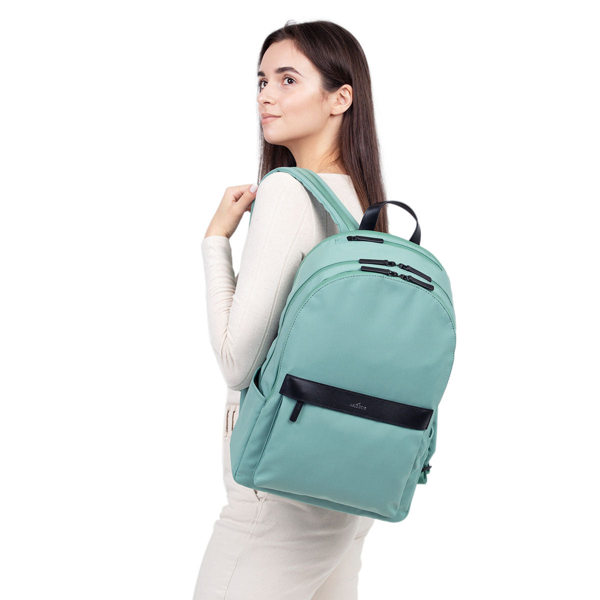 mint backpack front view hanging on model&#39;s left shoulder.