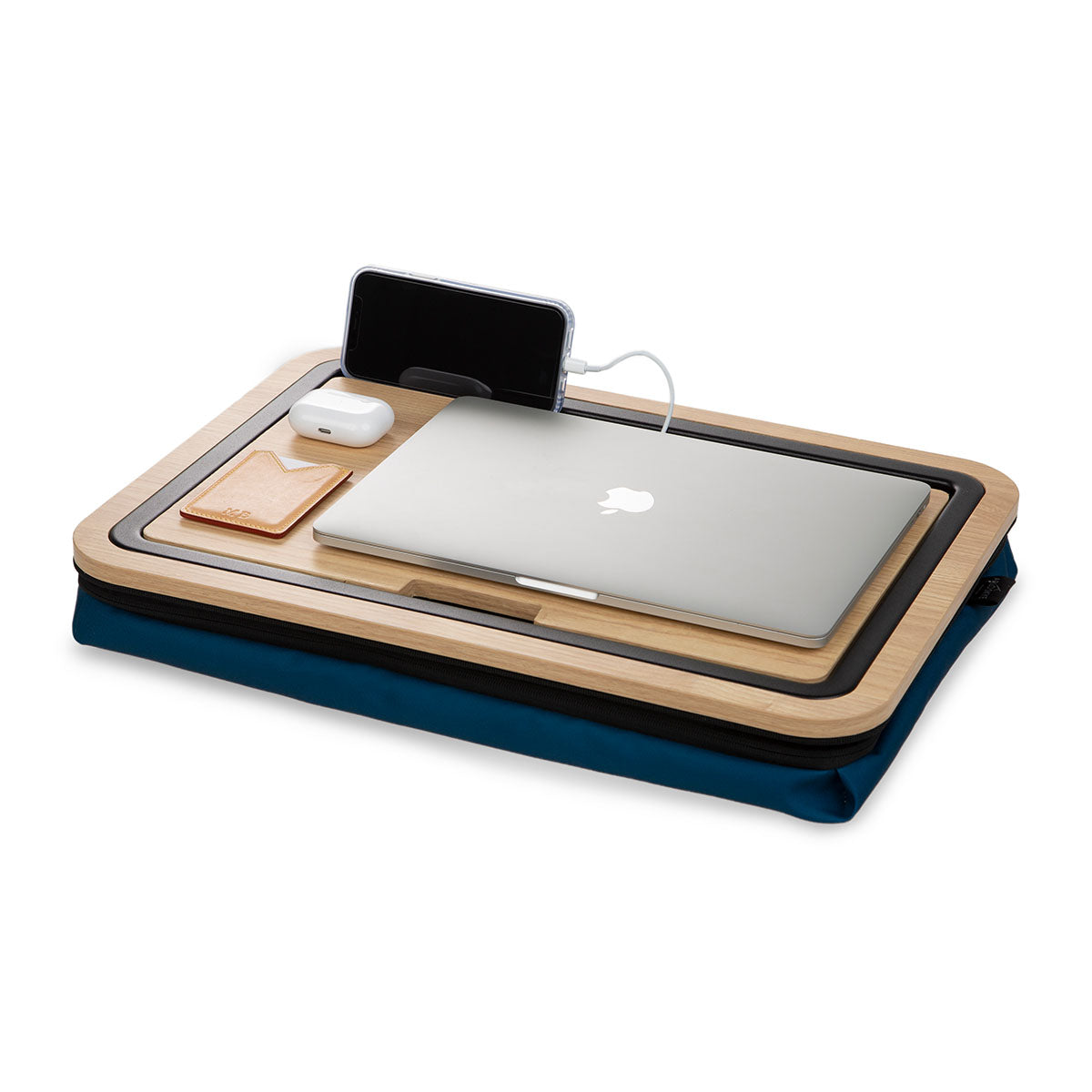 Front view of Lap Desk with cushion in cactus color laptop, card holder, airpods, and phone on surface.