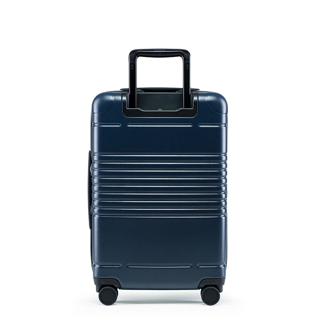 Back view of the zipper carry-on max  in navy blue