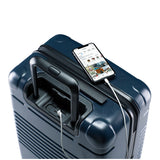 Top view of the zipper carry-on max in navy blue with spare charger in use