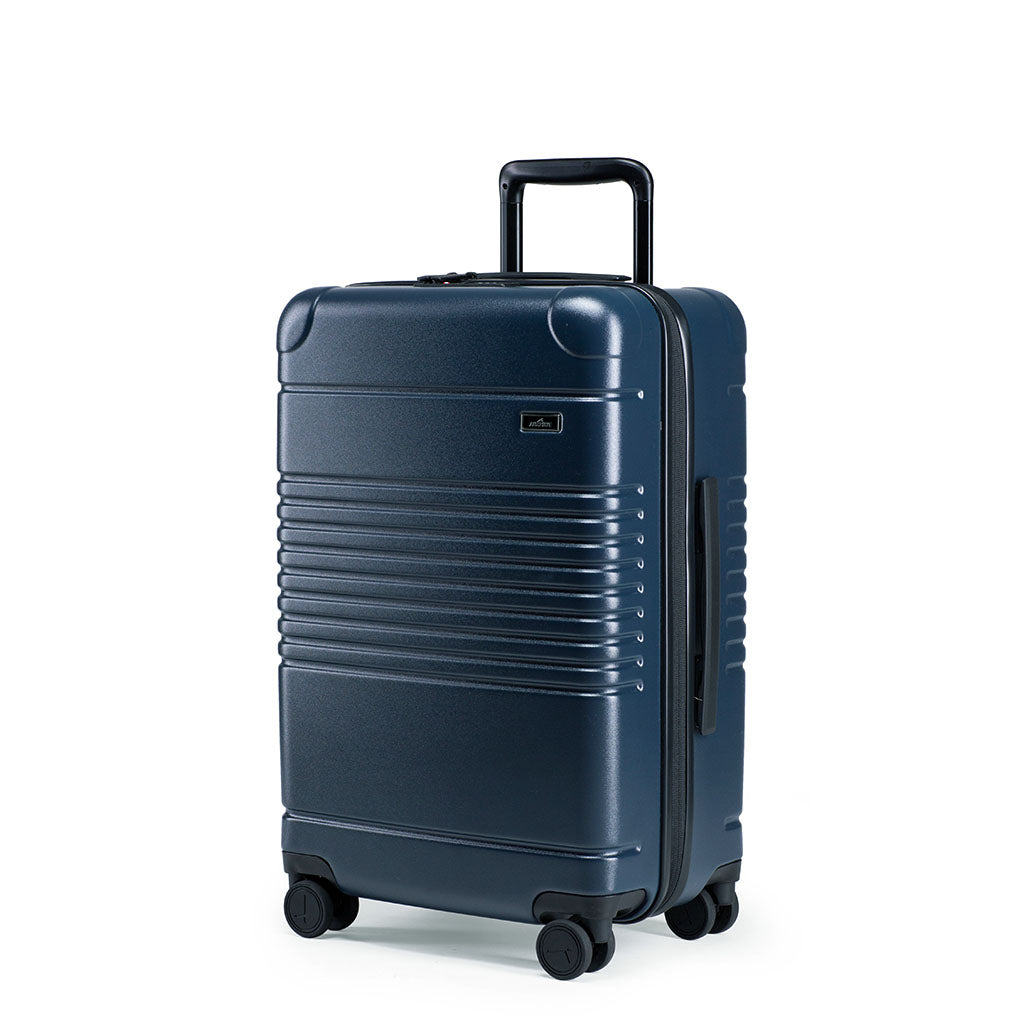 Left facing view of the zipper carry-on max in navy blue