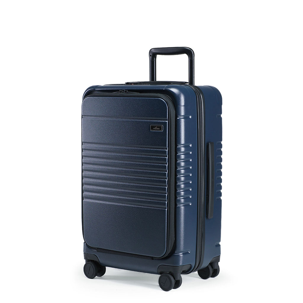 Left facing view of the zipper carry-on max with front pocket in navy blue