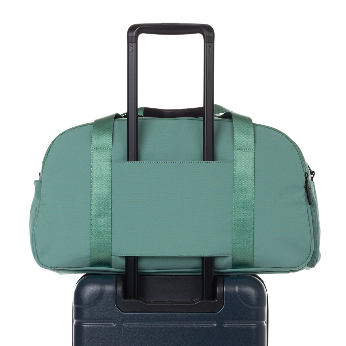 weekender in mint - back view on carry-on