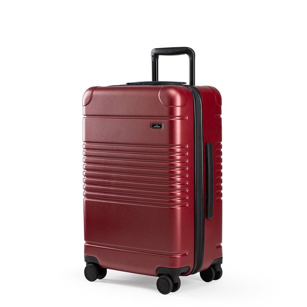 Left facing view of the zipper carry-on max in garnet