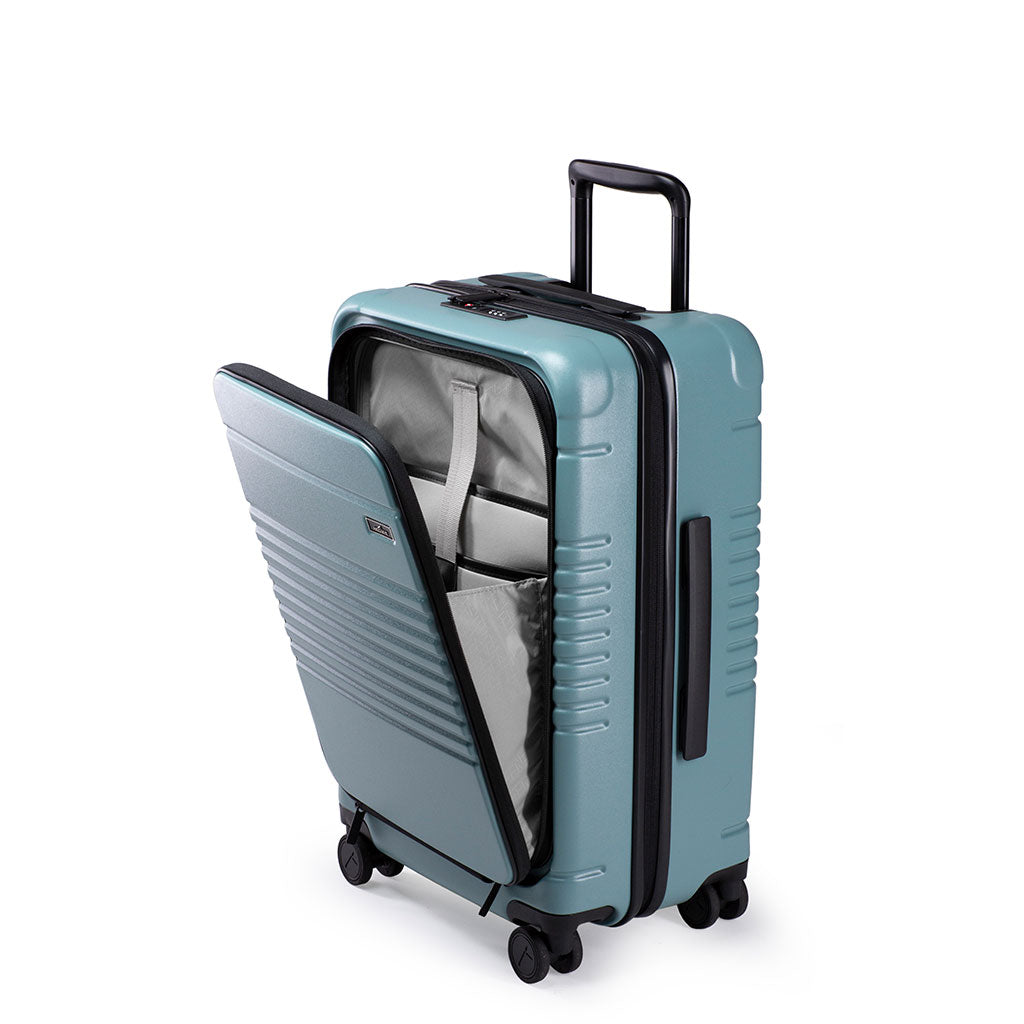 Left facing view of the zipper carry-on max with front pocket in sea sage 