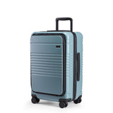 Left facing view of the zipper carry-on max with front pocket in sea sage 